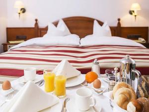 Posteľ alebo postele v izbe v ubytovaní Alpenhotel St.Christoph