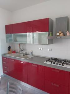 Η κουζίνα ή μικρή κουζίνα στο Attico Sweet Home Vitinia Roma