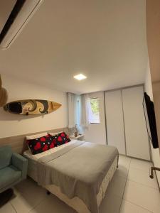 En eller flere senge i et værelse på Iloa Resort Barra de São Miguel + 24 billeder