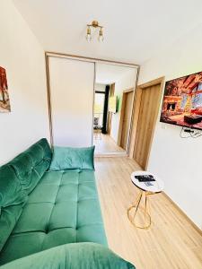 Χώρος καθιστικού στο Lexi Green Hills apartman