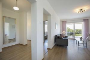 Posezení v ubytování Apartment Mirna with Swimming Pool