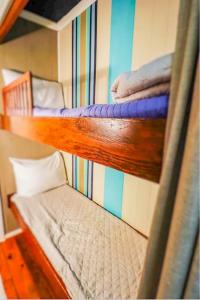 two bunk beds in a small room with at Seascape Retreat in Tybee Island