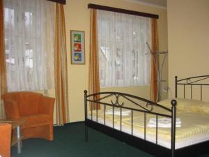 Posteľ alebo postele v izbe v ubytovaní Hotel Grand