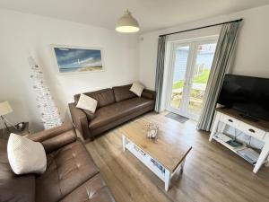 Μια τηλεόραση ή/και κέντρο ψυχαγωγίας στο New England Cottage