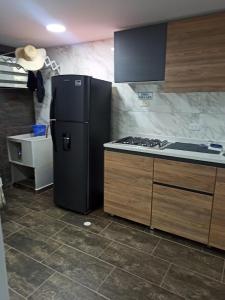 Nhà bếp/bếp nhỏ tại Apto Villas del Palmar