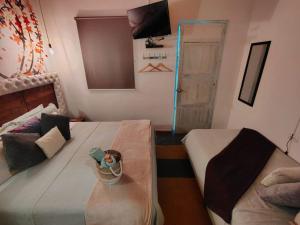 Un televizor și/sau centru de divertisment la Hotel Boutique Stay La 10