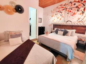Un pat sau paturi într-o cameră la Hotel Boutique Stay La 10