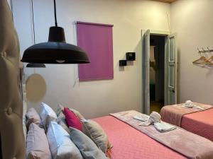 Un pat sau paturi într-o cameră la Hotel Boutique Stay La 10