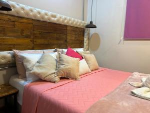 Un pat sau paturi într-o cameră la Hotel Boutique Stay La 10