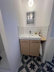 Et badeværelse på Petit nid en bord de mer