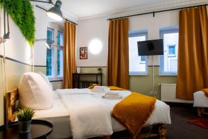 Postel nebo postele na pokoji v ubytování Hotel Alex Berlin