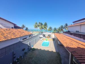 an overhead view of a building with a swimming pool at Pousada Rainha Formosa in Cabedelo