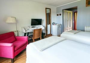 Postel nebo postele na pokoji v ubytování La Escondida Casa De Huespedes & Spa + 36 fotografií
