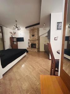 Telewizja i/lub zestaw kina domowego w obiekcie Cichy Kącik