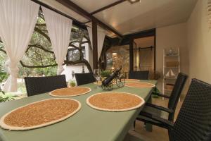 a table with four plates on top of it at Studio Šumbora in Peroj