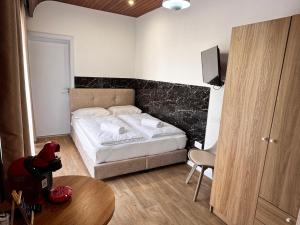 Ένα ή περισσότερα κρεβάτια σε δωμάτιο στο Modern StudioNr3 Kitchen bathroom Terrace +8 φωτογραφίες