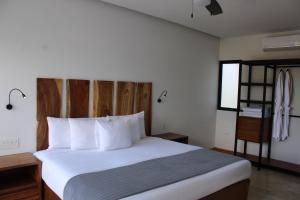 Katil atau katil-katil dalam bilik di Hotel B10 - Distinctive Hotel-
