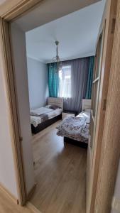 Ένα ή περισσότερα κρεβάτια σε δωμάτιο στο Villa Sunshine , whole apartments, апартаменты целиком