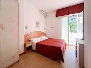 Postel nebo postele na pokoji v ubytování Hotel Chery