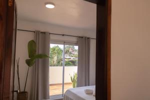 Voodi või voodid majutusasutuse Habitaciones con amplia terraza a minutos del centro toas