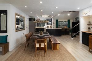 a dining room and kitchen with a table and chairs at Luxe Boutique-Style Home w/Indoor Hot Tub in Sedona
