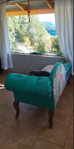 Et opholdsområde på Cabaña Rodar + 1 billede