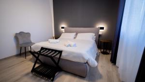 En eller flere senge i et værelse på Modern Room