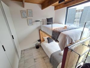 Ένα ή περισσότερα κρεβάτια σε δωμάτιο στο 32 on Park Unit 22