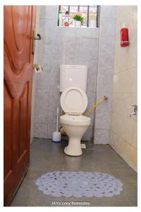 Koupelna v ubytování JAYs cosy homestay