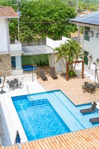 Πισίνα στο ή κοντά στο Hotel Equinocios Executive