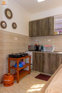 Kuchyň nebo kuchyňský kout v ubytování PAWA Homestays Studio California + 14 fotografií