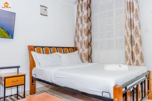 Postel nebo postele na pokoji v ubytování PAWA Homestays Studio California