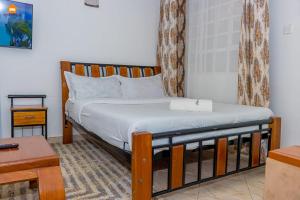 Postel nebo postele na pokoji v ubytování PAWA Homestays Studio California