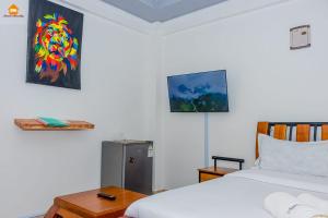 Postel nebo postele na pokoji v ubytování PAWA Homestays Studio California