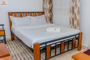 Postel nebo postele na pokoji v ubytování PAWA Homestays Studio California