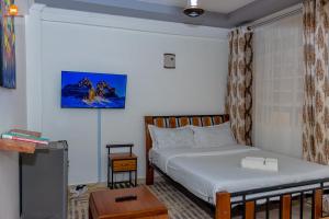 Postel nebo postele na pokoji v ubytování PAWA Homestays Studio California