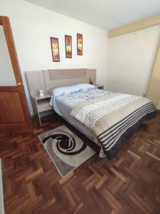 Postel nebo postele na pokoji v ubytování Elegante Confortable Apartament