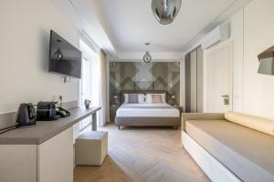 Postel nebo postele na pokoji v ubytování Hezio Guest House