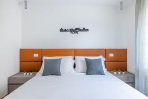 Postel nebo postele na pokoji v ubytování Hezio Guest House