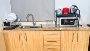 Kuchyň nebo kuchyňský kout v ubytování Villa Kiara