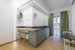Kuchyň nebo kuchyňský kout v ubytování Hezio Guest House