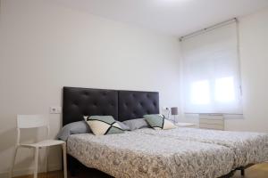 Postel nebo postele na pokoji v ubytování Piso electra
