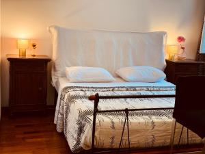 A bed or beds in a room at House Maximo at Colosseum Még 18 kép