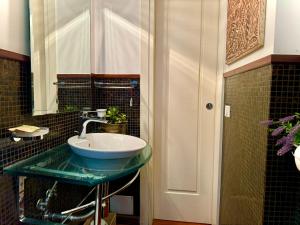 A bathroom at House Maximo at Colosseum