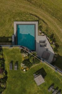 The swimming pool at or close to Rainell Dolomites Retreat