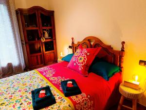 a bedroom with a bed with two trays on it at Cal Jan HUT6-8208 in Aixovall +94 photos