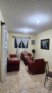 Χώρος καθιστικού στο Tiny & Cozy House