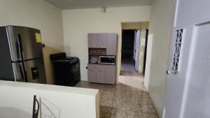 Η κουζίνα ή μικρή κουζίνα στο Tiny & Cozy House