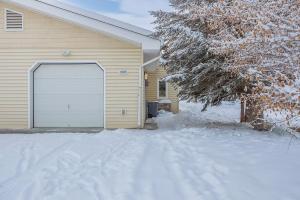 a house with a garage in the snow at Wondrous Willow in Fairbanks