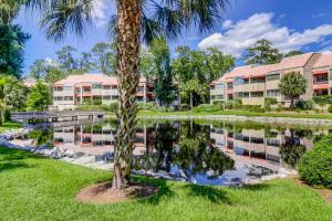 a palm tree in front of a building at Anchorage 7444 in Hilton Head Island
